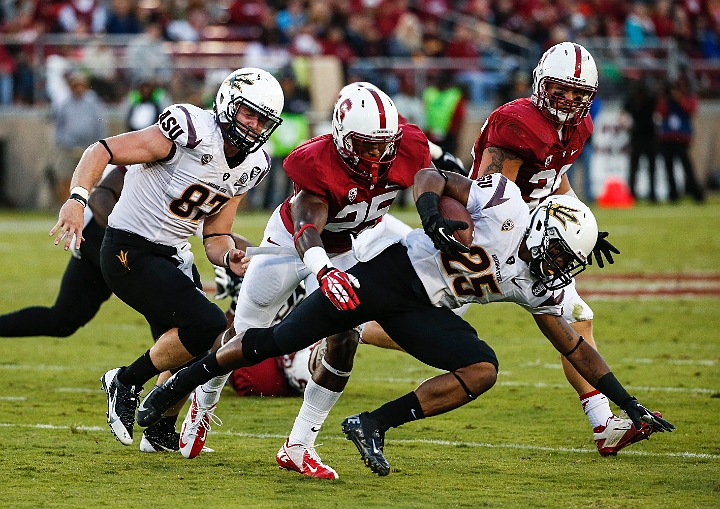 2013StanfordASU-032.JPG - Sept.21, 2013; Stanford, CA, USA; Arizona State Sun Devils running back Deantre Lewis (25) is tackled by cornerback Alex Carter (25) in game against the Stanford Cardinal at  Stanford Stadium. Stanford defeated Arizona State 42-28.